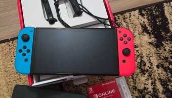 Nintendo Switch OLED + hra Super Mario Party Jambore v záruc - 3