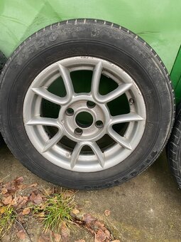 Originální Alu kola Ford - 175/70 R14 4x108 - 3