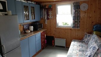 Staveb.pozemek s chatkou - 3
