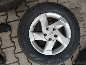 ALU LITÁ KOLA NA DACIA DUSTER 16", 215/65/16 - 3