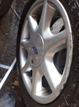 ALU kola original Ford 6Jx15H2E740 - 3