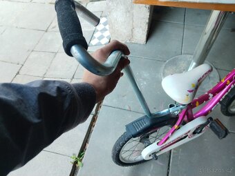 Pomocné kolečka a vodící tyč - 3