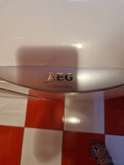 Pračka AEG ELEKTROLUX s horním plněním - 3