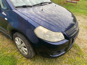 Prodám náhradní díly na Suzuki SX4 z auta najeto 240 tis km - 3