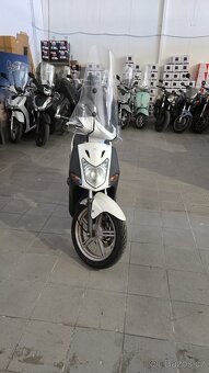 Kymco Agility 125 (2013) plexi, kufr, řp.sk. B - 3