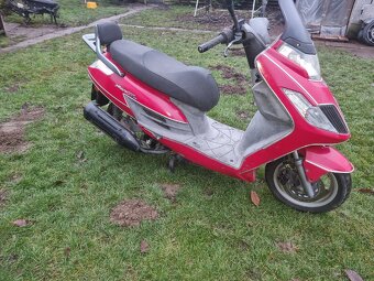 Kymco Yager 125, Dink 125 - 3