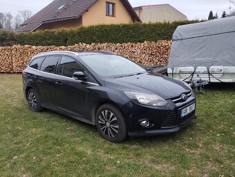 Ford Focus 1,6 - 3