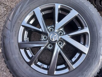 Prodám sadu Orig ALU kol Mazda 215/65R16 zimní - 3
