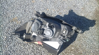 pravý světlomet Clio3 - 3