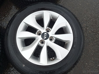 4x100 Kia Rio 5,5Jx15" ET36 č. 52910-1W650 alu disky - 3