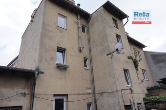 Prodej bytového domu s komerčními prostory a s garáží, Tepli - 3
