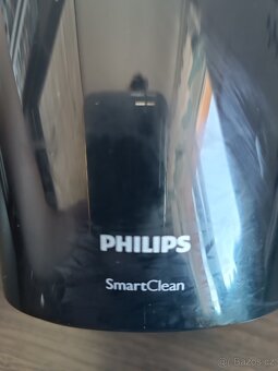 Čistící a nabíjení základna Philips JC5203 - 3