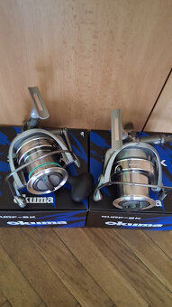 Nové Navijáky Okuma Surf 8k.. - 3