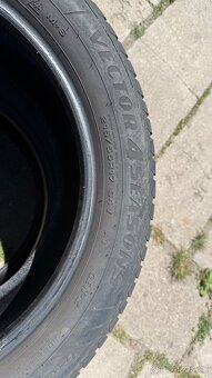 Prodám 2x celoroční pneu Good Year 215/55 R17 94V - 3