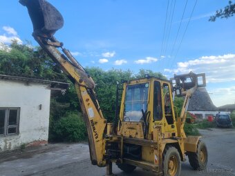 Traktorbagr Komatsu WB60A - 3