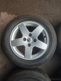 Prodám sadu ALU disků PEUGEOT + letní pneu 185/65/R15 - 3