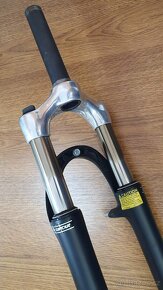 Odpružená vidlice SUNTOUR nrx 7500 28" - 3