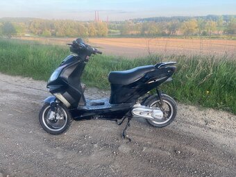skutr rhon 50 2t - 3