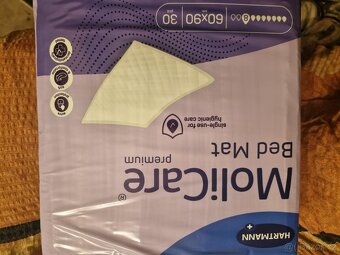 Prodám plenky pro dospělé a jedno balení podložek - 3