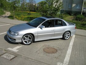 Opel Omega B přední spoiler, kryty prahů STEINMETZ look - 3