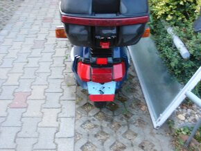 skutr honda - 3