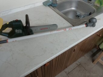 Dětská pila, křovinořez a helma - 3