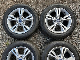 Alu orig zimní sada Ford Focus 5x112 7J ET50 215/55 R16 - 3
