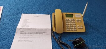 Sarý přenosný telefon - 3
