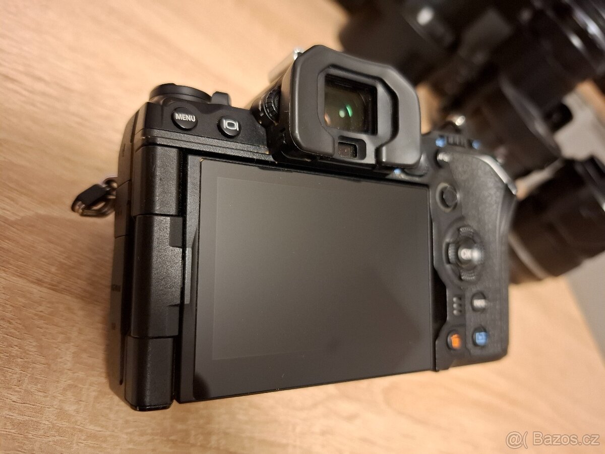 Olympus / System OM-1 + - 4