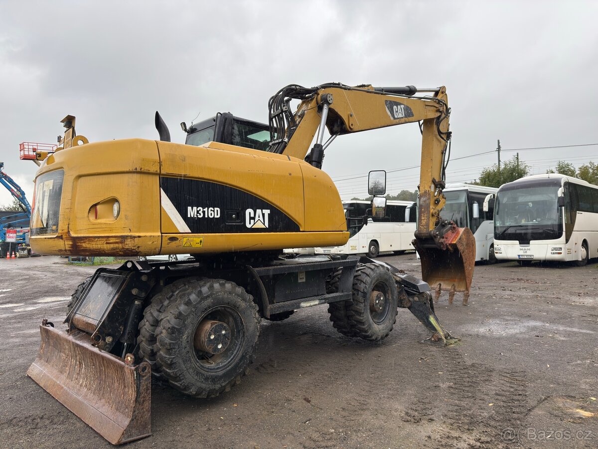 Kolový rypadlo Caterpillar M316D - 4