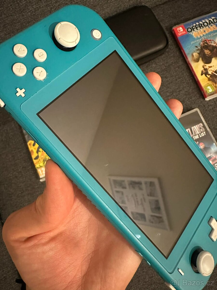 Nintendo switch lite + 4 skvělé hry - 4