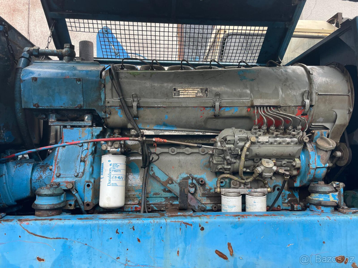 Kolový bagr 714.4 - 4