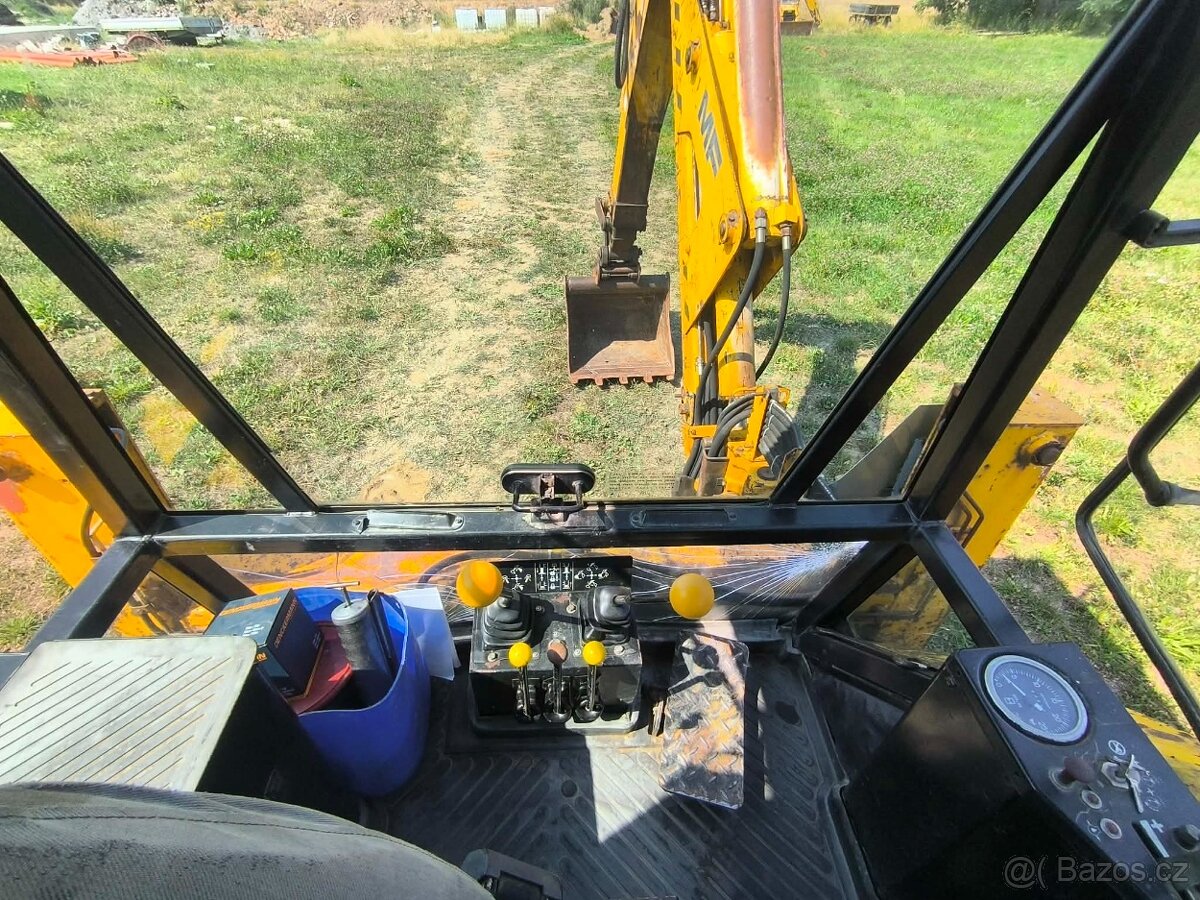Traktorbagr MF 60HX 4x4 - 4