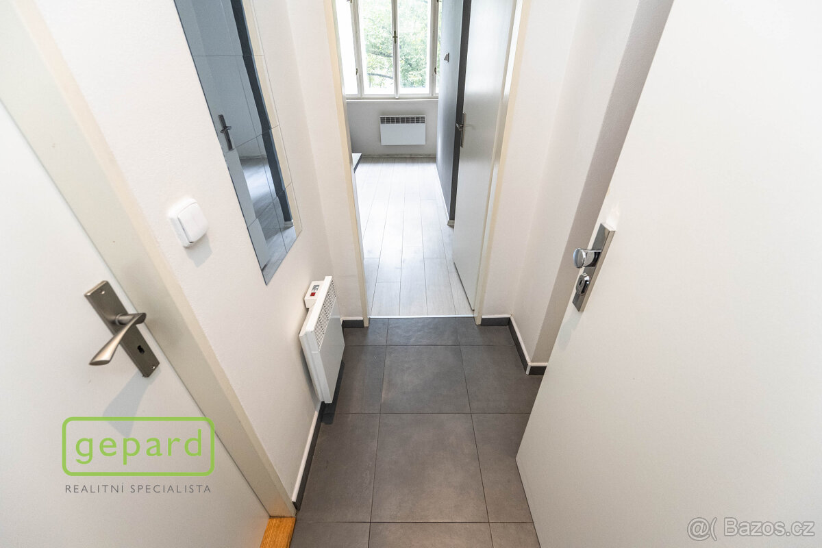 Spoluvlastnický podíl 1/2, rodinný dům Káranská, Praha 10 - - 4