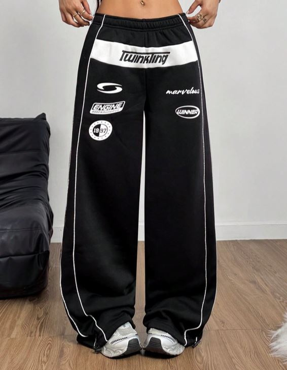 NOVÉ DÁMSKÉ ČERNÉ TEPLÁKY S POTISKEM vel.XS/34 - 4