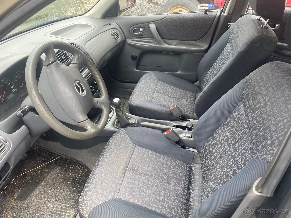 Mazda 323 - 4