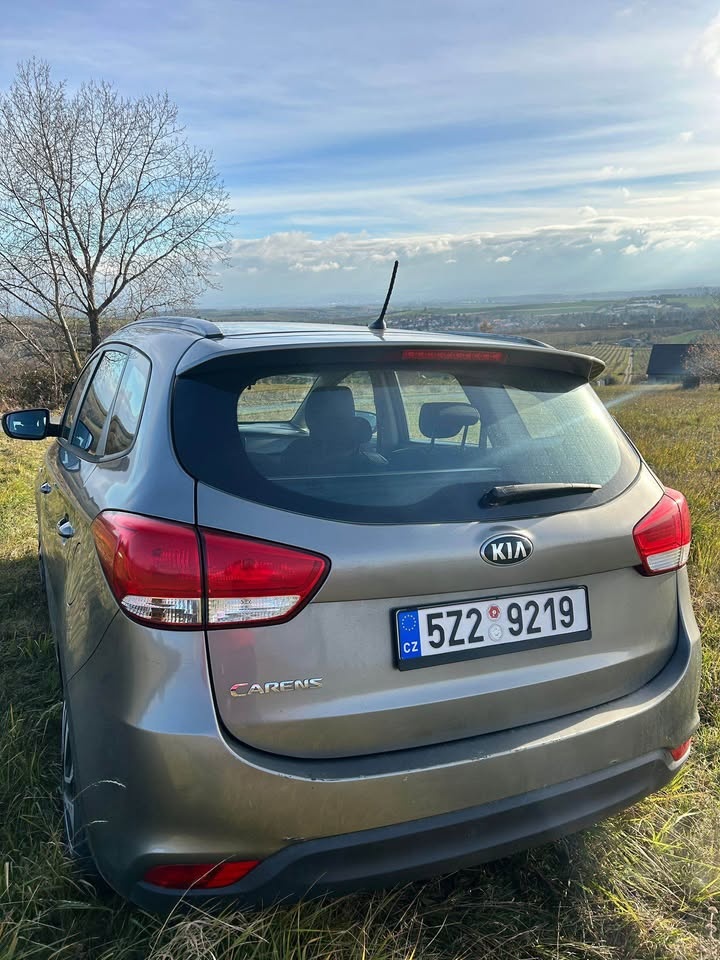 Kia carens - 4