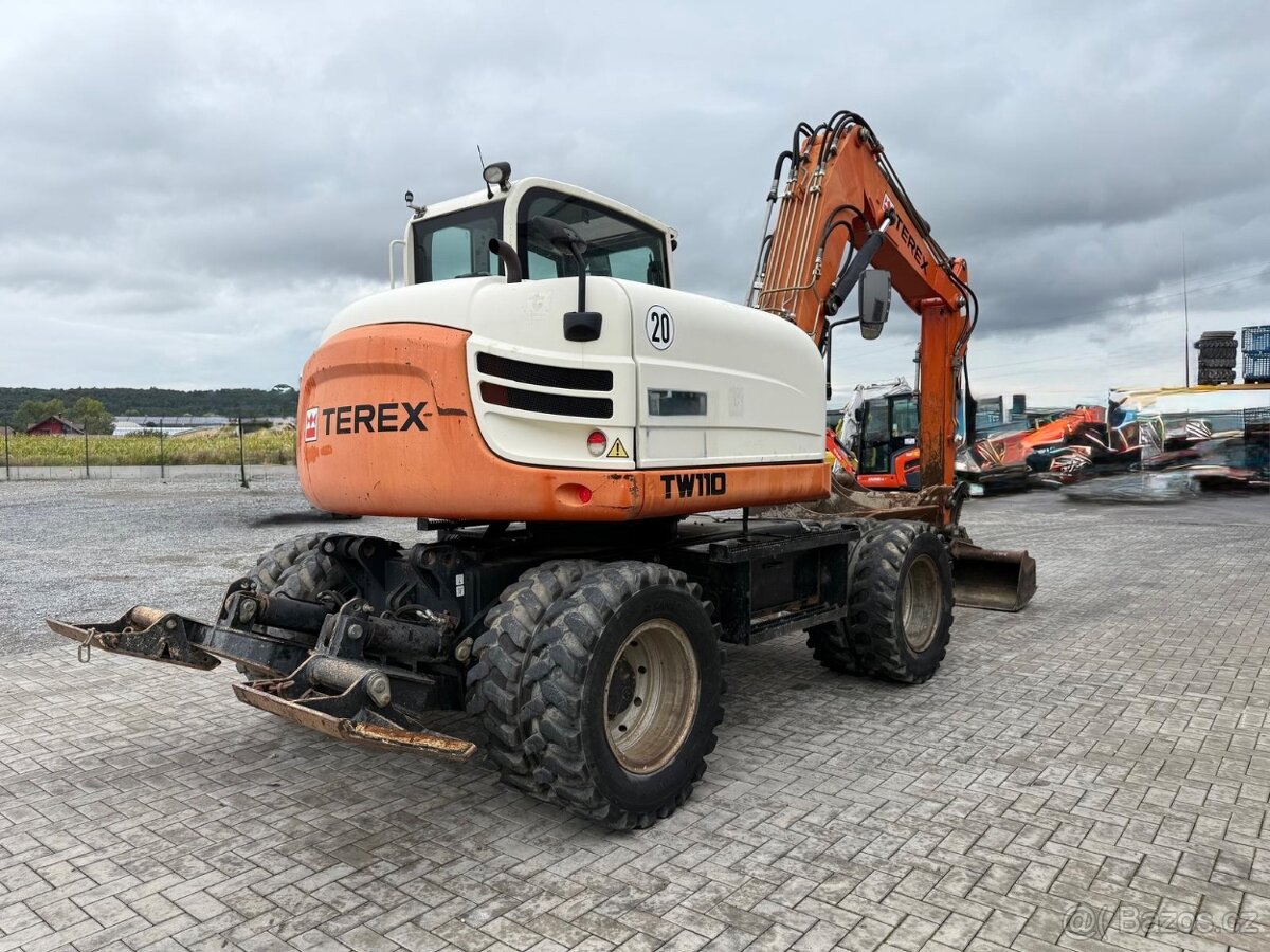 Kolový otočný bagr TEREX TW 110 - 4