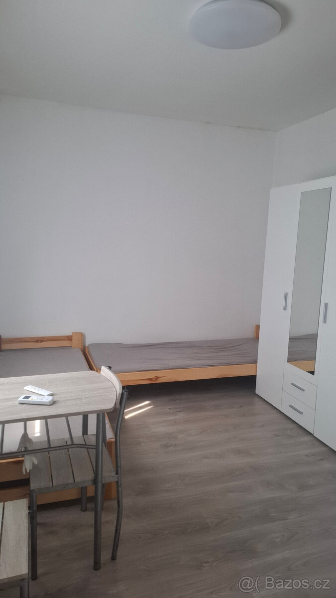 pronájem bytu 1+kk v přístavbě RD - 4