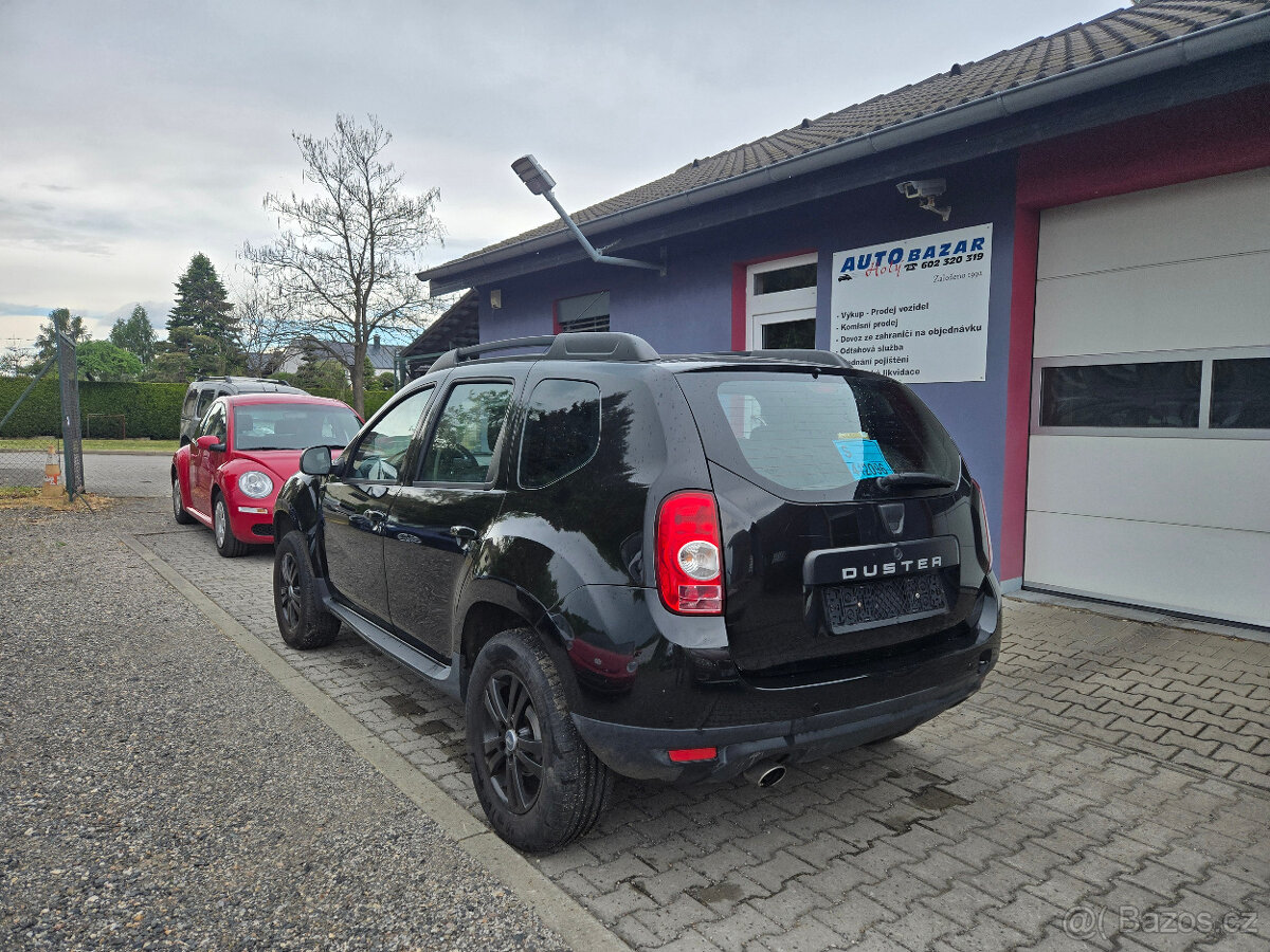 Duster 1,6 16V-77kW LAUREATE+sada zimních kol - 4