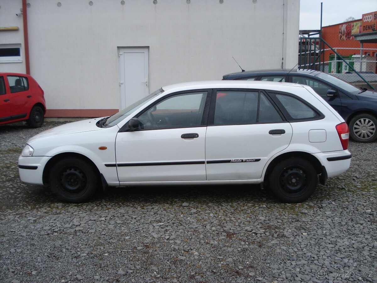 Mazda 323 F 1.3 i - 4