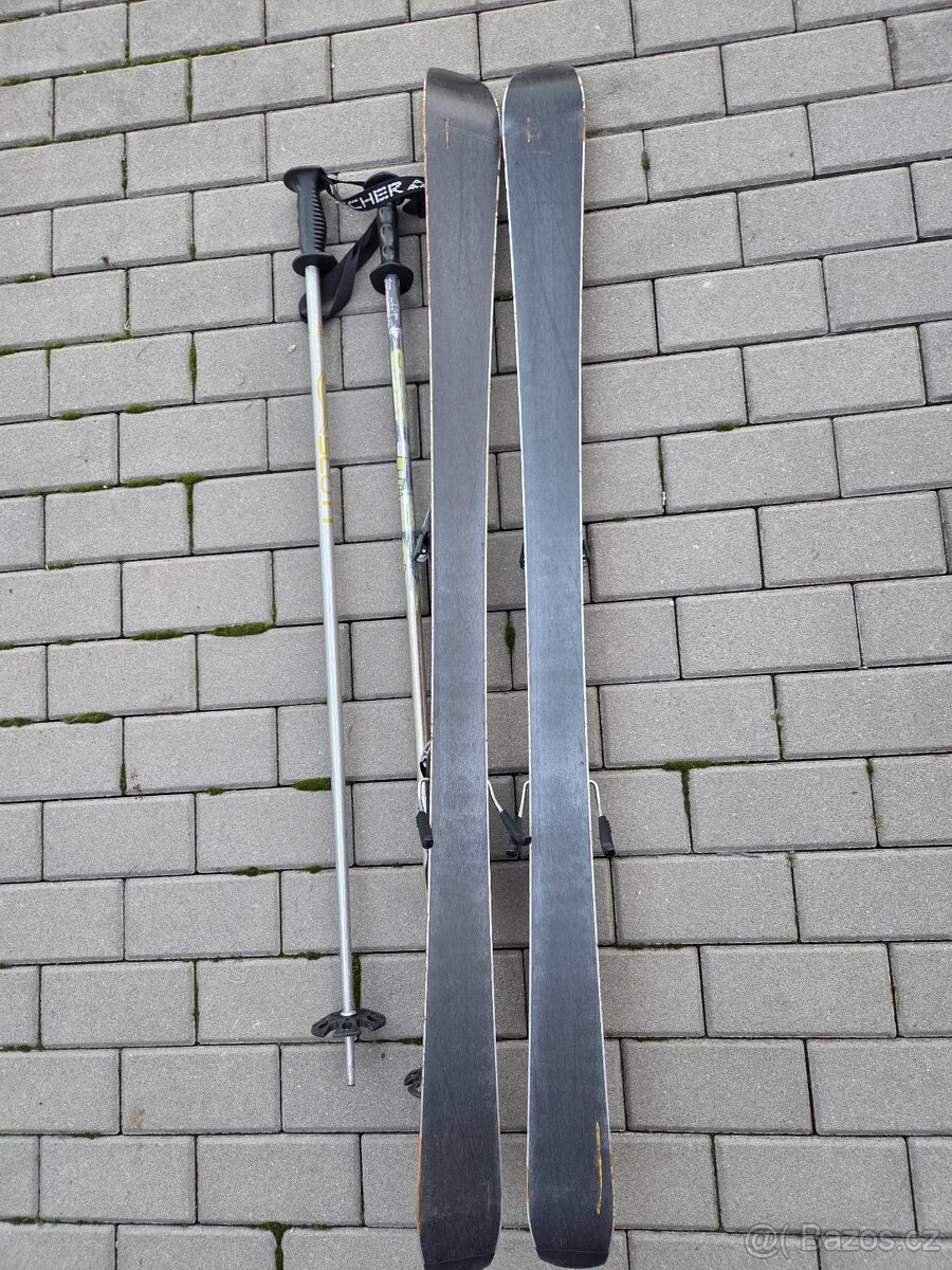 Dětské lyže 138 + lyžáky 25.5 - 4