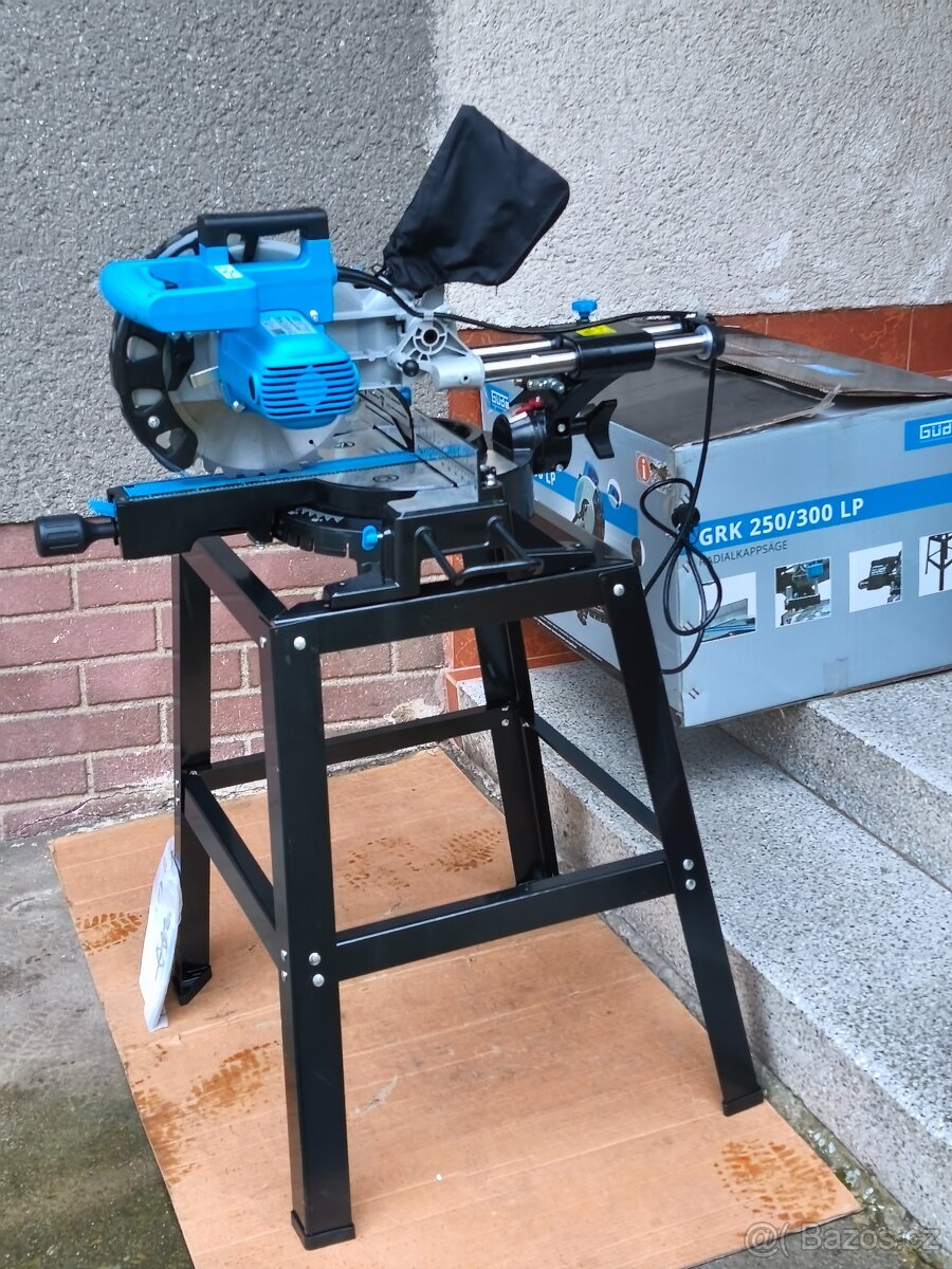 Prodám VĚTŠÍ NEPOUŽITOU pokosovou pilu s posuvem GÜDE GRK 25 - 4