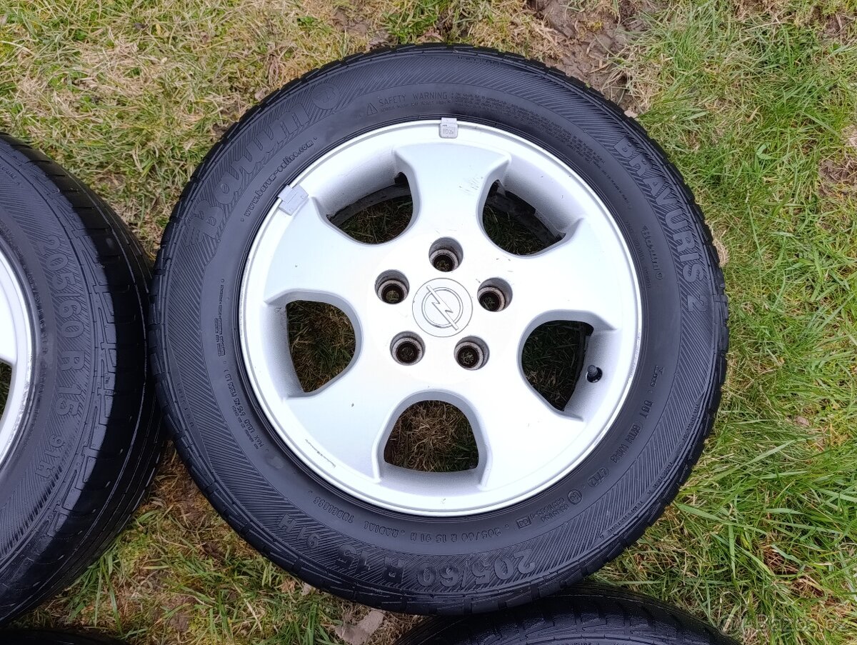 Prodám sadu ALU disků Opel R15 5x110 - 4