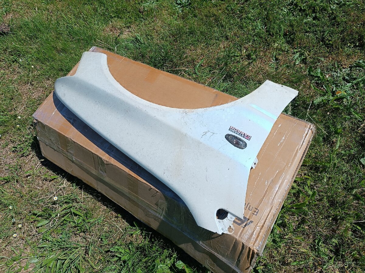 Mitsubishi Lancer Evo Blatníky, palubka,topení - 4