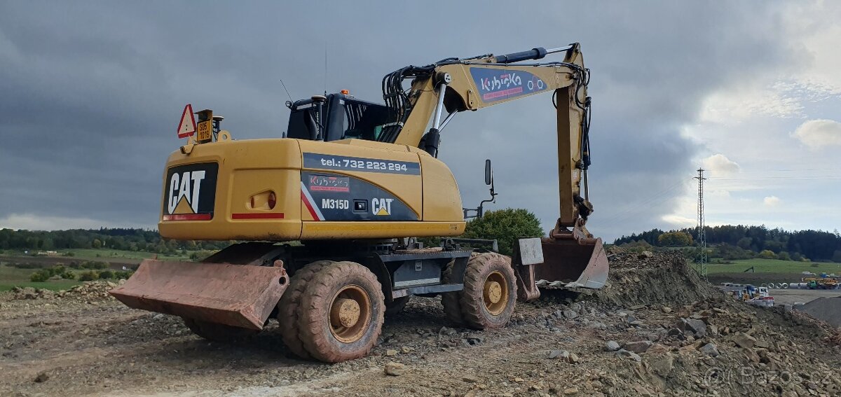 Kolový bagr Cat 315D - 4