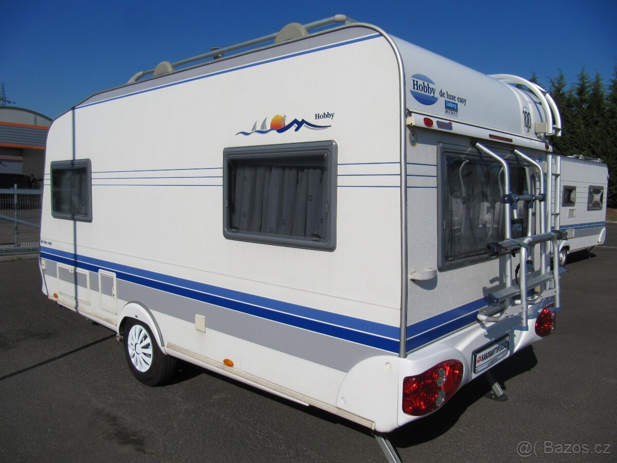 Prodám karavan Hobby 450 sf,r,v..2005 + mover + klima + stan