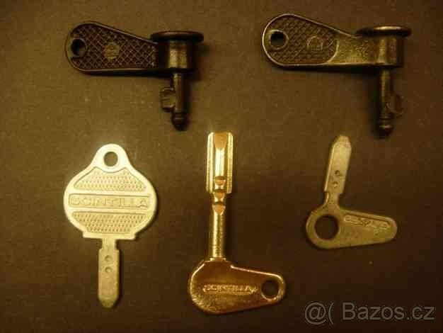 Škoda těžítko, klíče,víčka odlitky. - 4