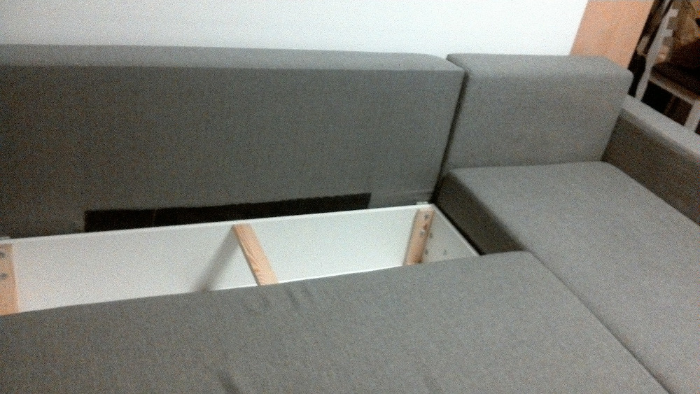 Rohová rozkládací sedačka s úložným prostorem - 4