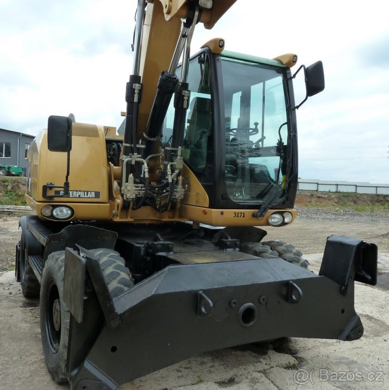 CATERPILLAR M313D - kolové rýpadlo, - 4